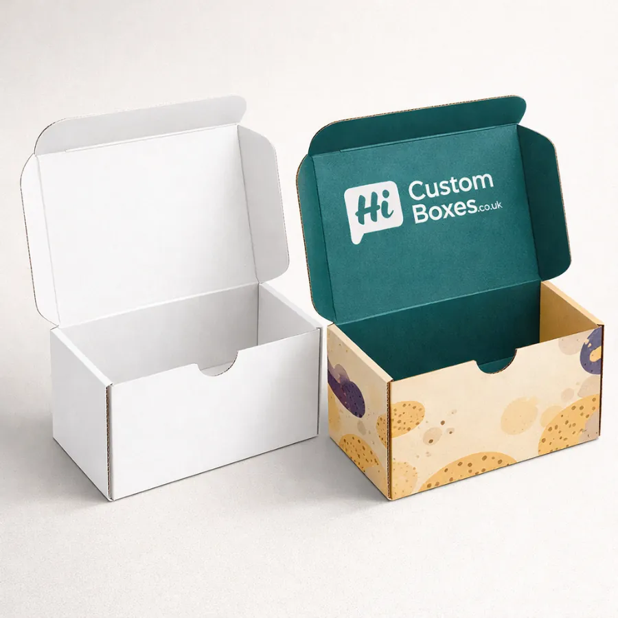 Two open rectangular mailing boxes- one plain white and one with a branded teal lid- class=